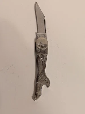 Navaja de bolsillo plegable vintage 1924-1933 REMINGTON UMC plateada NEHI AD pierna de dama Foto 1 de 4