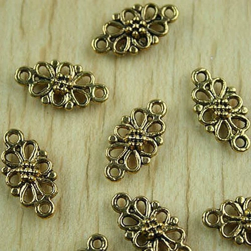Dijes de flores en tono dorado oscuro de 16*8 mm 30 piezas hallazgos H1492 Foto 1 de 1
