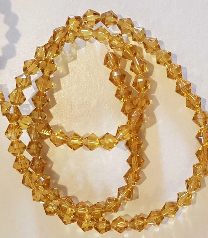 160 Glass Faceted Bicone Spacer Beads - 4mm -  (2 Strands) - PALE AMBER BROWN - Image 1 of 1