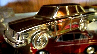 wonderful silverplated moneybox VOLVO 244DL 1977 - made for VOLVO as PR-article - Image 1 of 3