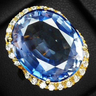 Anillos con halo de oro de 24 quilates de plata de ley 925 ovalados de tanzanita azul brillante de 24,42 quilates Foto 1 de 4