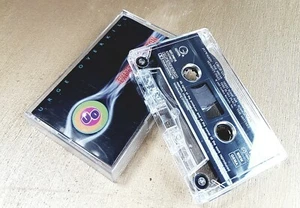 URGE OVERKILL - EXIT THE DRAGON  14  TRACK  UK CASSETTE ALBUM   - Picture 1 of 1