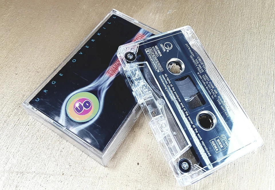 URGE OVERKILL - EXIT THE DRAGON  14  TRACK  UK CASSETTE ALBUM   - Image 1 of 1