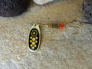 SPINNER MEPPS AGLIA BLACK FURY IN GOLD MIT GELBEN PUNKTEN ALLE GROESSEN - Bild 1 von 1