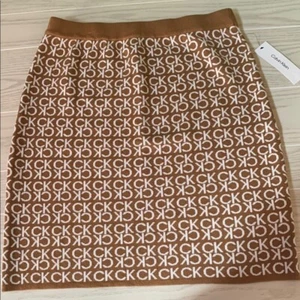 Calvin Klein Women's knit skirt brown luggage Tan white size large CK - Imagen 1 de 6