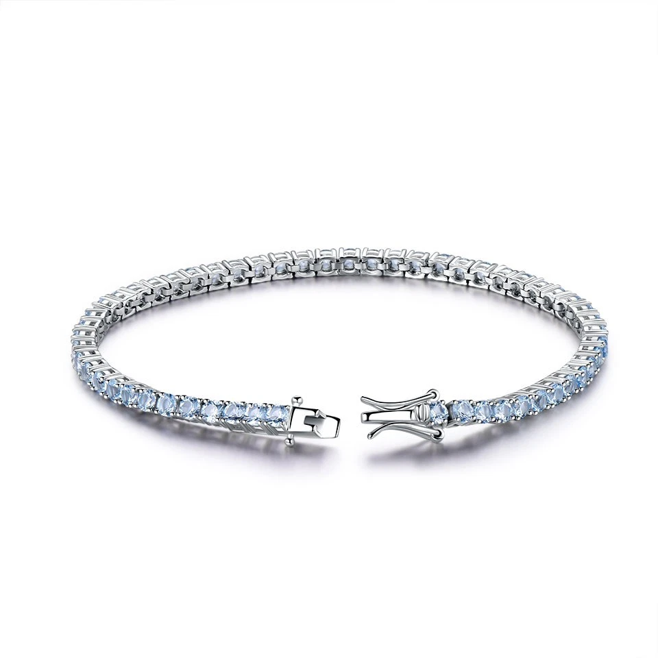 White Gold Plated 925 Sterling Silver Round Cut Sky Blue Topaz Tennis Bracelet - Image 1 of 4