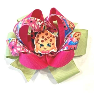 Hermoso arco de cabello inspirado en ""Kooky Cookie"" Shopkins para niñas. - Imagen 1 de 2