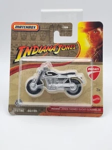 Tarjeta corta Matchbox 1/64 Indiana Jones Ducati Scrambler línea principal - Imagen 1 de 3