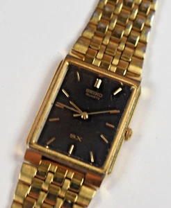 Reloj de cuarzo vintage Seiko SX Tank unisex tono dorado esfera negra V701-5K40 - Imagen 1 de 7