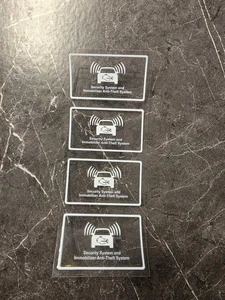 4 piezas. Sistema de Seguridad Vehículo Inmovilizador Antirrobo UV DTF CALCOMANÍA Adhesivo Transparente - Imagen 1 de 5