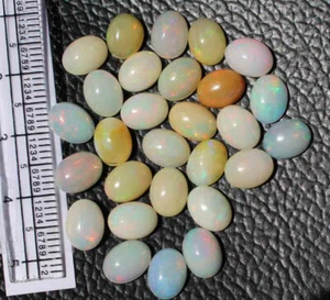 Opale naturale etiope Welo multi fuoco ovale cabochon pietra preziosa sfusa 21,90 ct - Foto 1 di 4
