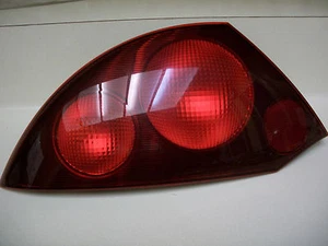 MITSUBISHI ECLIPSE 01 02 TAIL LIGHT OEM ORIGINAL LH FACTORY LENS CHIPPED - Picture 1 of 2