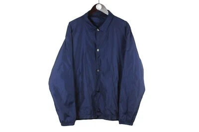 Chaqueta cortavientos Acne Studios Tony Face talla XL azul claro con cuello Foto 1 de 4