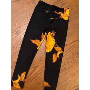 New Lularoe Kids S/M Gold/Orange Floral Leggings Black Background - Picture 1 of 2