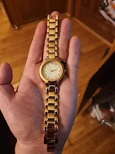 Rocawear White Pearlized Dial Crystal Accent Round Case Gold Tone Band Watch - Picture 1 of 5