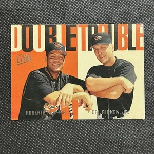 1997 Ultra Cal Ripken Jr. / Roberto Alomar Double Trouble #1 Baltimore Orioles - Foto 1 di 2
