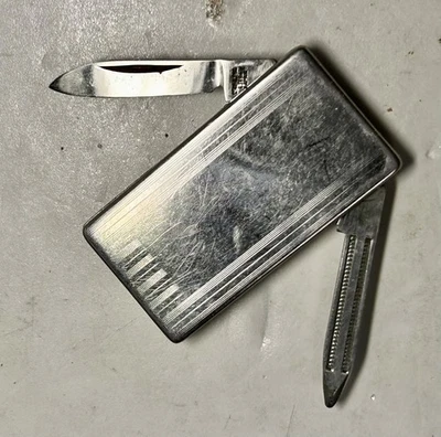 Clip de dinero vintage años 70 con cuchillo plegable y lima de uñas acero inoxidable imperial EE. UU. Foto 1 de 4