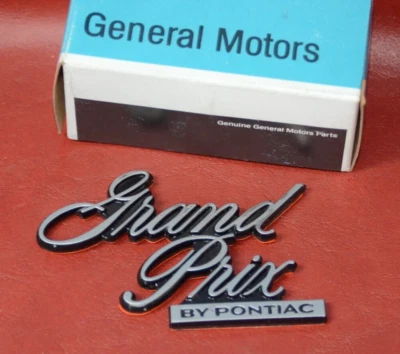 Новый из старых запасов 1976-77 Pontiac Grand Prix крышка багажника шильдик эмблема значок GM 1700916 - Изображение 1 из 4
