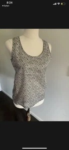 Top sin mangas floral Sook para dama PVP $99 NUEVO CON ETIQUETAS talla XS - Imagen 1 de 7