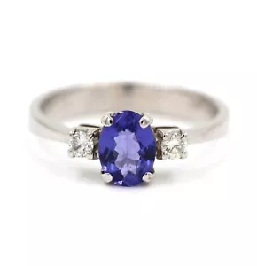 Anello Infije in Oro Bianco 18k con Tanzanite forma Ovale e due diamanti - Foto 1 di 5