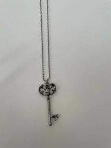 Collana a palline con ciondolo a chiave in acciaio - Foto 1 di 4