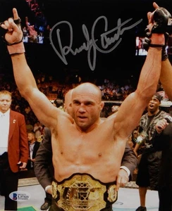 Randy Couture Autographed UFC 8x10 Photo With Belt- Beckett Auth *Silver - Picture 1 of 2