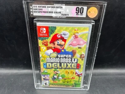 Primera impresión Super Mario Bros U Deluxe Nintendo Switch VGA 90 WATA sellado de fábrica Foto 1 de 4