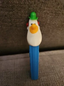 1975 Pez Dispenser Austria No Feet Long Face Clown Green Hat Yellow Nose RARE - Picture 1 of 4