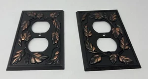 2 Stück AmerTac Bronze Kupfer Optik Blatt Steckdosenabdeckungen - Bild 1 von 4