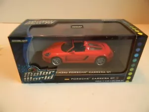 GREENLIGHT MOTOR WORLD 86010 1:43 PORSCHE CARRERA GT - RED - 2009 - *NIB* - Picture 1 of 6