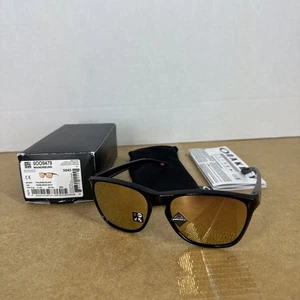 Gafas de sol Oakley Manorburn pulidas negras/oro rosa Prizm, nuevas en caja/OO9479-05 - Imagen 1 de 3