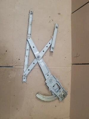 83-86 Nissan Datsun 720 OEM regulador de ventana lado del pasajero 37 k millas Foto 1 de 3