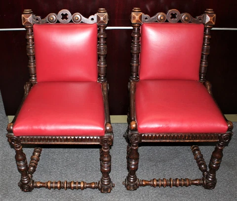 Pair of Renaissance Revival Style Carved Oak Dining Chairs on Casters Cover