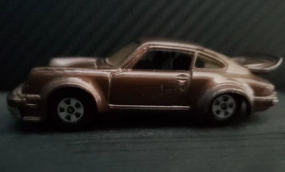 Винтажный 1981 ERTL Cannonball Run Шоколадно-коричневый Porsche 930 Металл Гонконг Очень хорошее состояние - Изображение 1 из 4