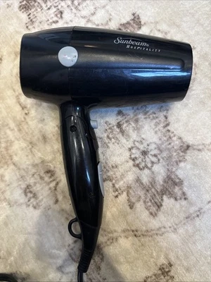 Secador de pelo plegable Sunbeam Hospitality negro, modelo HD 3005005 probado Foto 1 de 4