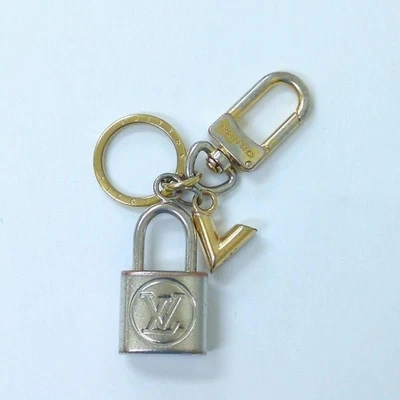 Chaveiro autêntico Louis Vuitton Kaleido V Patrock M67376 ouro JPN M67376 - Imagem 1 de 4