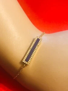 MICHAEL KORS GOLDTONE BRACELET WITH A DARK BLUE INLAY AND SHIMMERING CRYSTALS - Picture 1 of 8