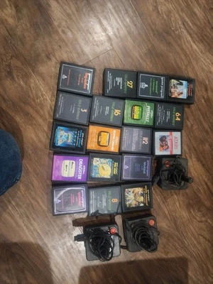 Atari 2600 Game Lot. 18 Games Missile Command, Pac-man, ET, 3 Joy Sticks - Image 1 of 4