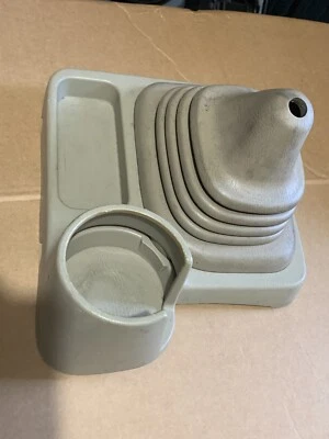 Portavasos Nissan Frontier 2x2 consola central palanca de cambios arranque 98-00 TAN Foto 1 de 4