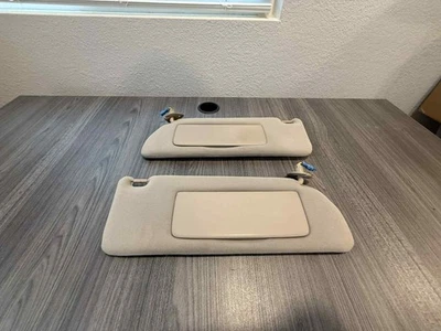 Par de parasoles Lexus SC300 SC400 1992-2000 bronceados con Homelink - OEM usados Foto 1 de 3