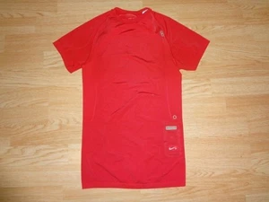 Camisa de compresión sin costuras roja Nike Dri Fit S para niños jóvenes ver medida - Imagen 1 de 1