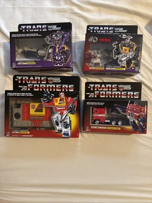 TRANSFORMERS REISSUE G1 OPTIMUS PRIME & ASTRO TRAIN & BOMBSHELL & BLASTER * NEW* - Image 1 of 4