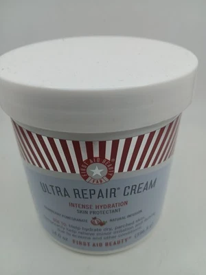 Crema reparadora First Aid Beauty Ultra hidratación intensa arándano grana sellada  Foto 1 de 4