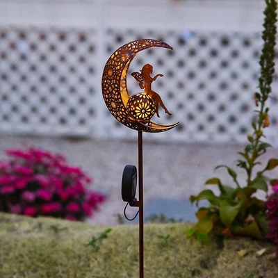 Lámpara de césped decorativa con marco de hierro y luz de jardín de hadas solares para exteriores Foto 1 de 4