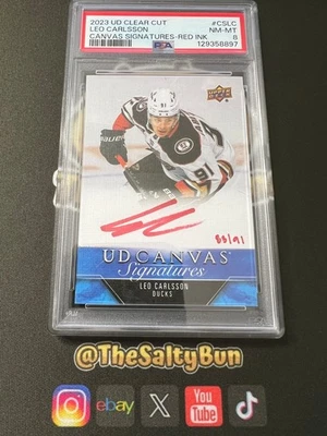 2023 Upper Deck Clear Cut Canvas Signatures Red Ink Auto Leo Carlsson /91 PSA 8  - Image 1 of 2