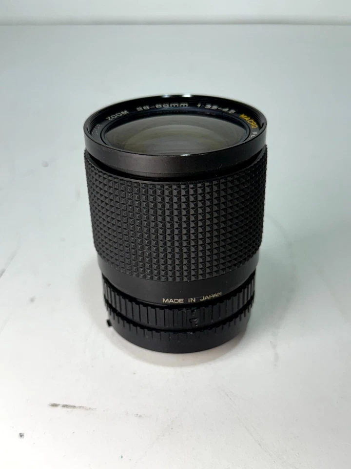 Lente zoom macro Sakar vintage longitud focal 28-80 mm 1:3,5-4,5 No.356704 negro Foto 1 de 4