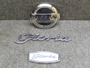 JDM NISSAN GLORIA Y34 PLATA CROMO EMBLEMAS FÁBRICA OEM - Imagen 1 de 11