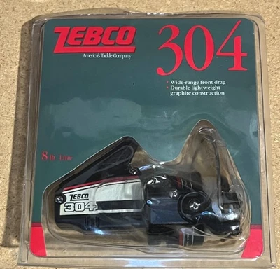 Carrete de pesca giratorio Zebco 304 línea 8 lb - vintage 1990 sellado en paquete Foto 1 de 4