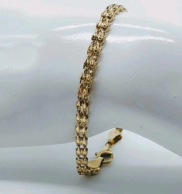 Pulsera de eslabones texturizados vintage de oro amarillo de 14k Foto 1 de 4