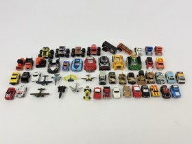 Lot of 52 Vintage Galoob Micro Machine Vehicles and Highway Warriors Covers